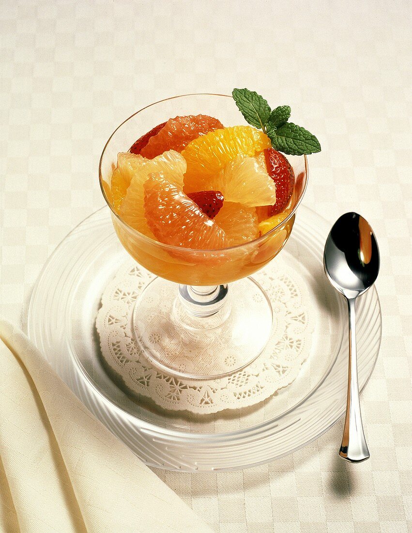 Fruit Compote with Mint Leaf Garnish