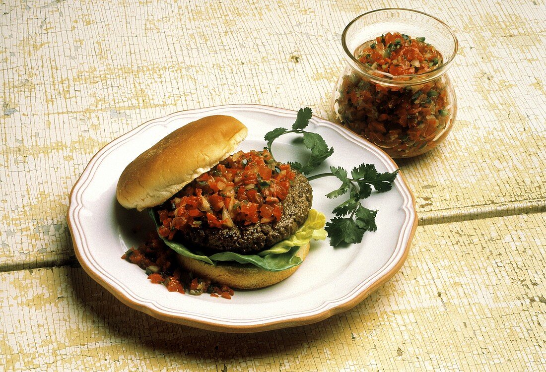 Hamburger on a Bun with Salsa and Lettuce