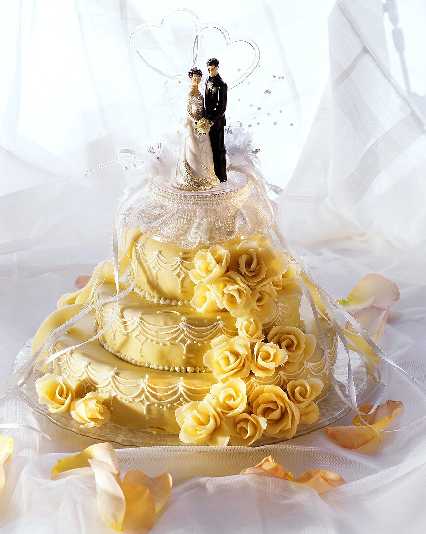 Three Tier Wedding Cake with Bride and Groom