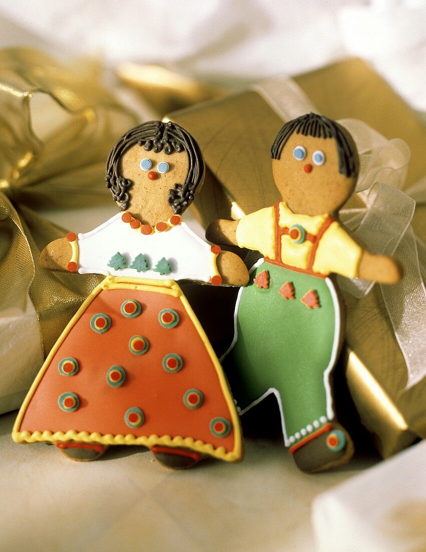 Zwei Lebkuchenfiguren (Frau & Mann) mit Zuckergussbekleidung