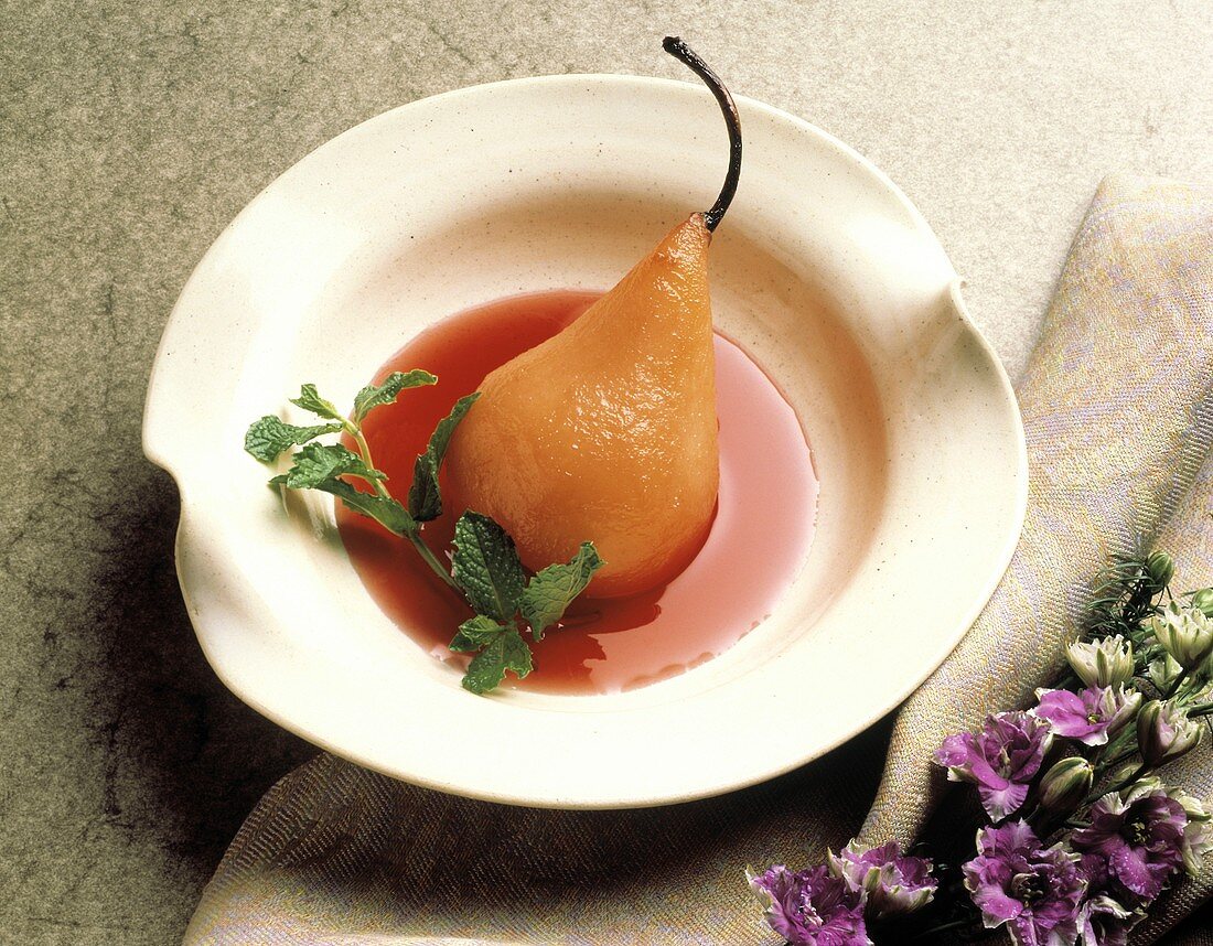 Poached Pear in a Berry Sauce