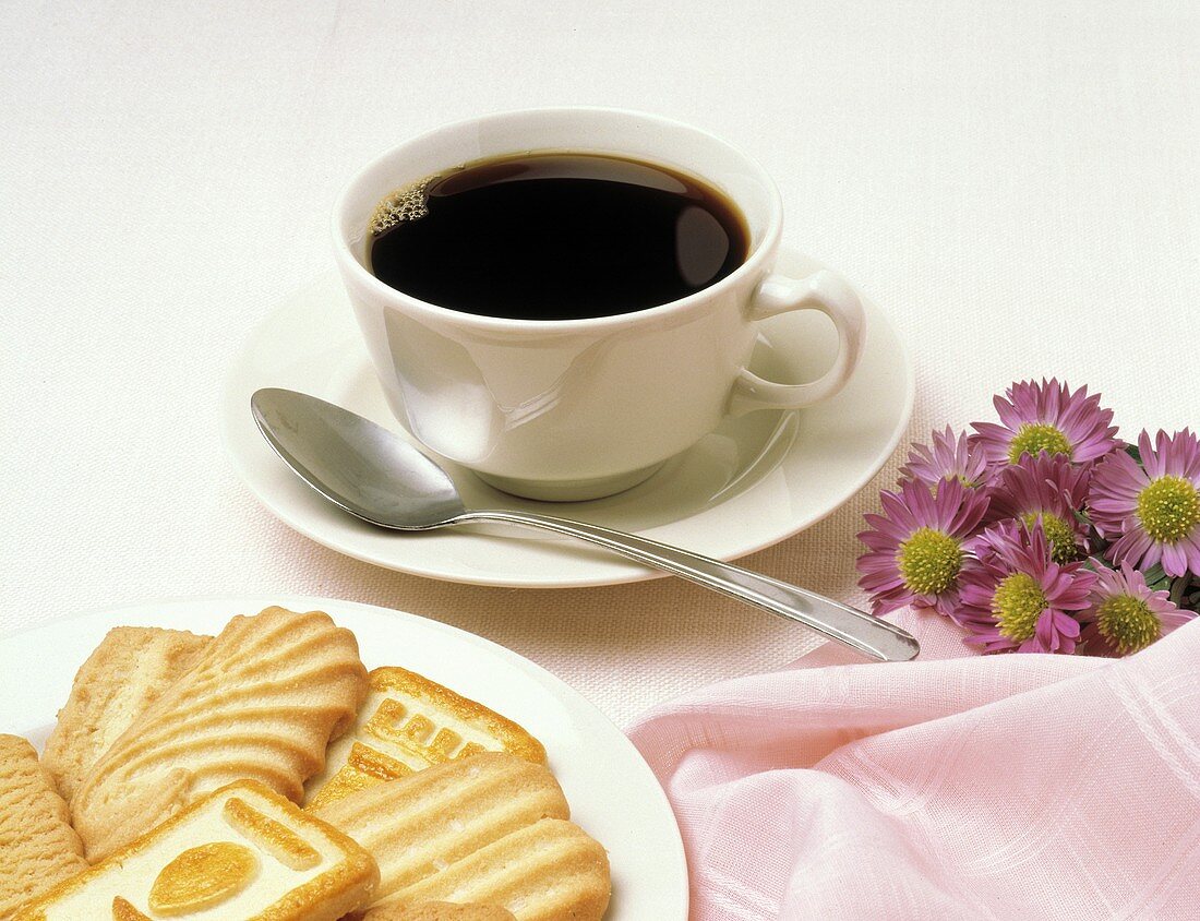 Cup of Black Coffee with Sugar Cookies