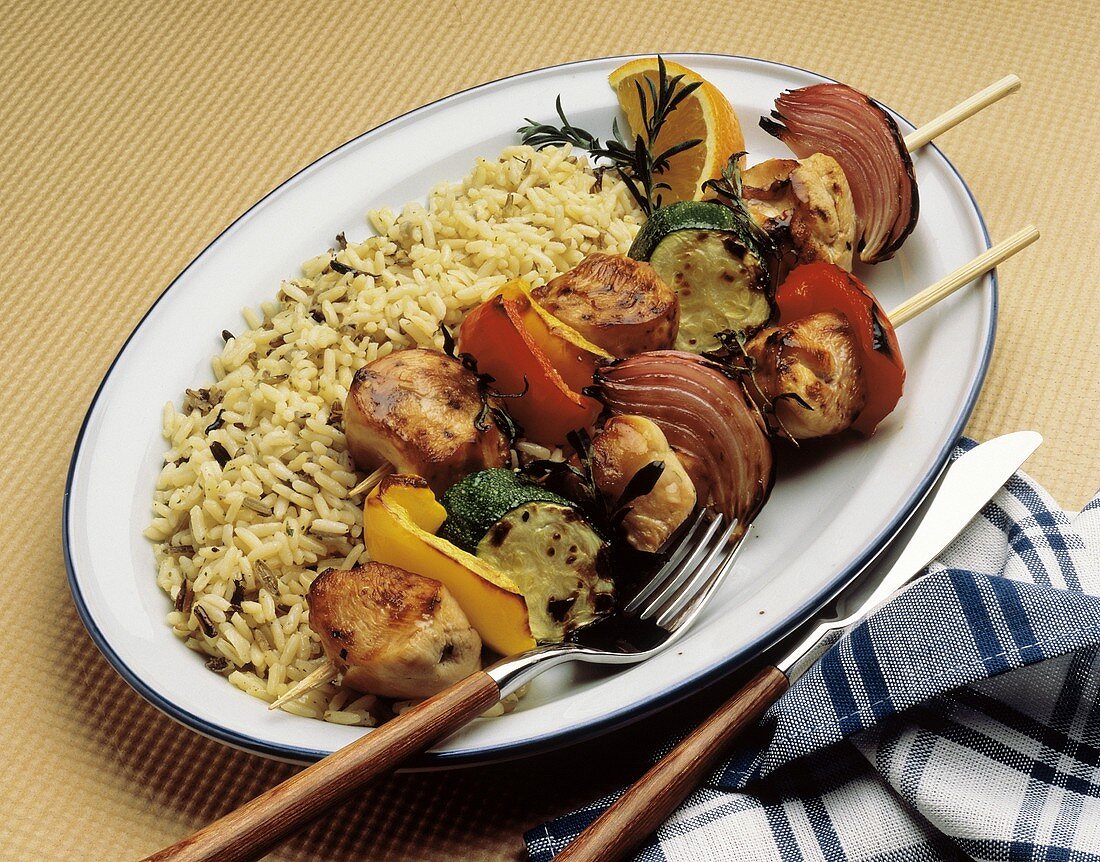 Pork and Vegetable Kabobs on Bed of Rice