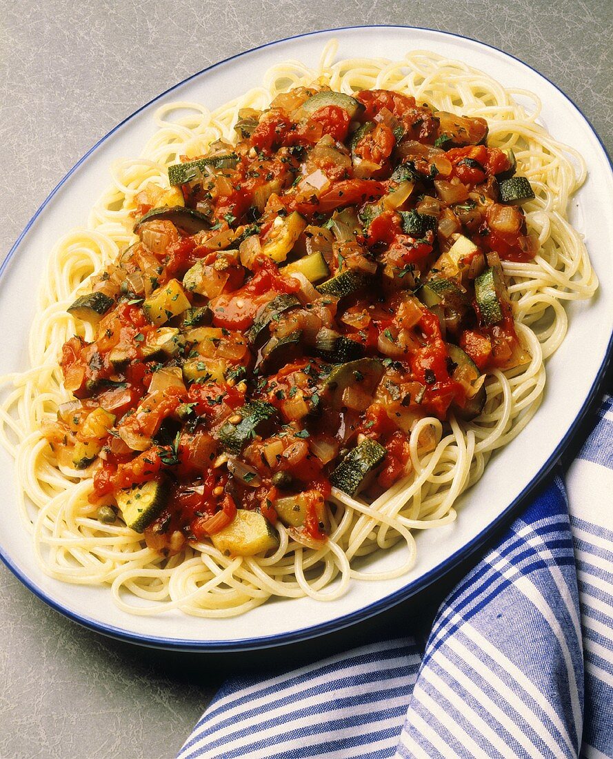 Spaghetti with zucchini tomato sauce