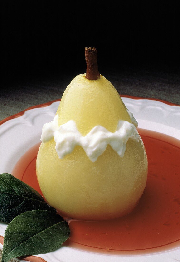 Whole Poached Pear in a Berry Sauce