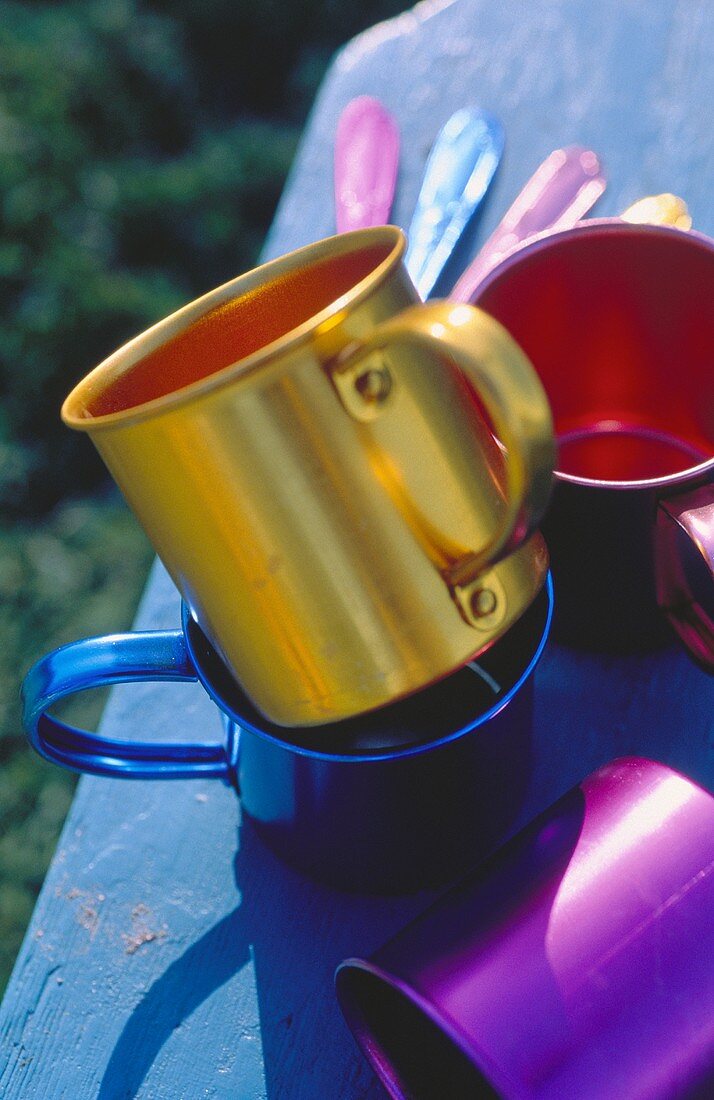 Bright Metal Coffee Cups and Spoons