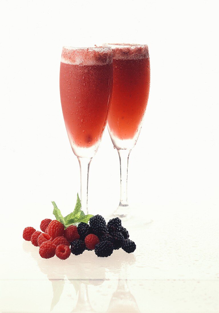 Champagne Cocktails with Raspberries & Blackberies