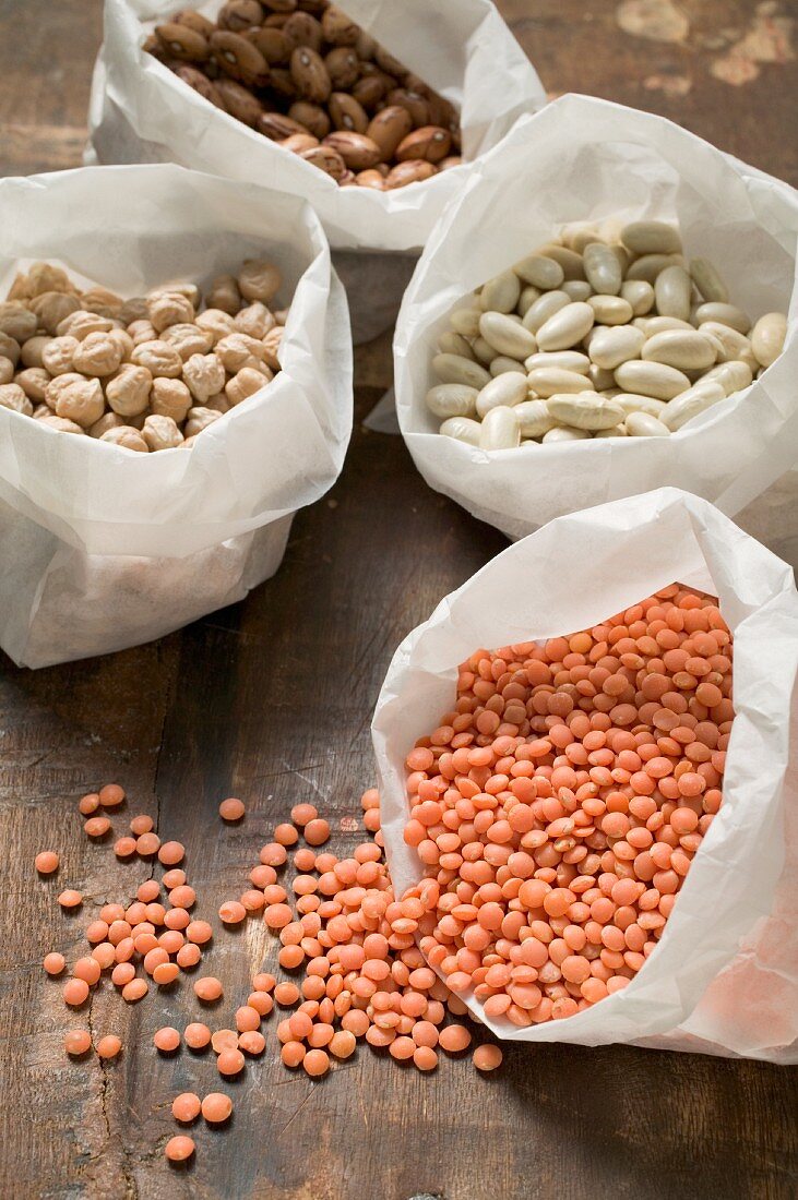 Dried beans, chickpeas and lentils in paper bags