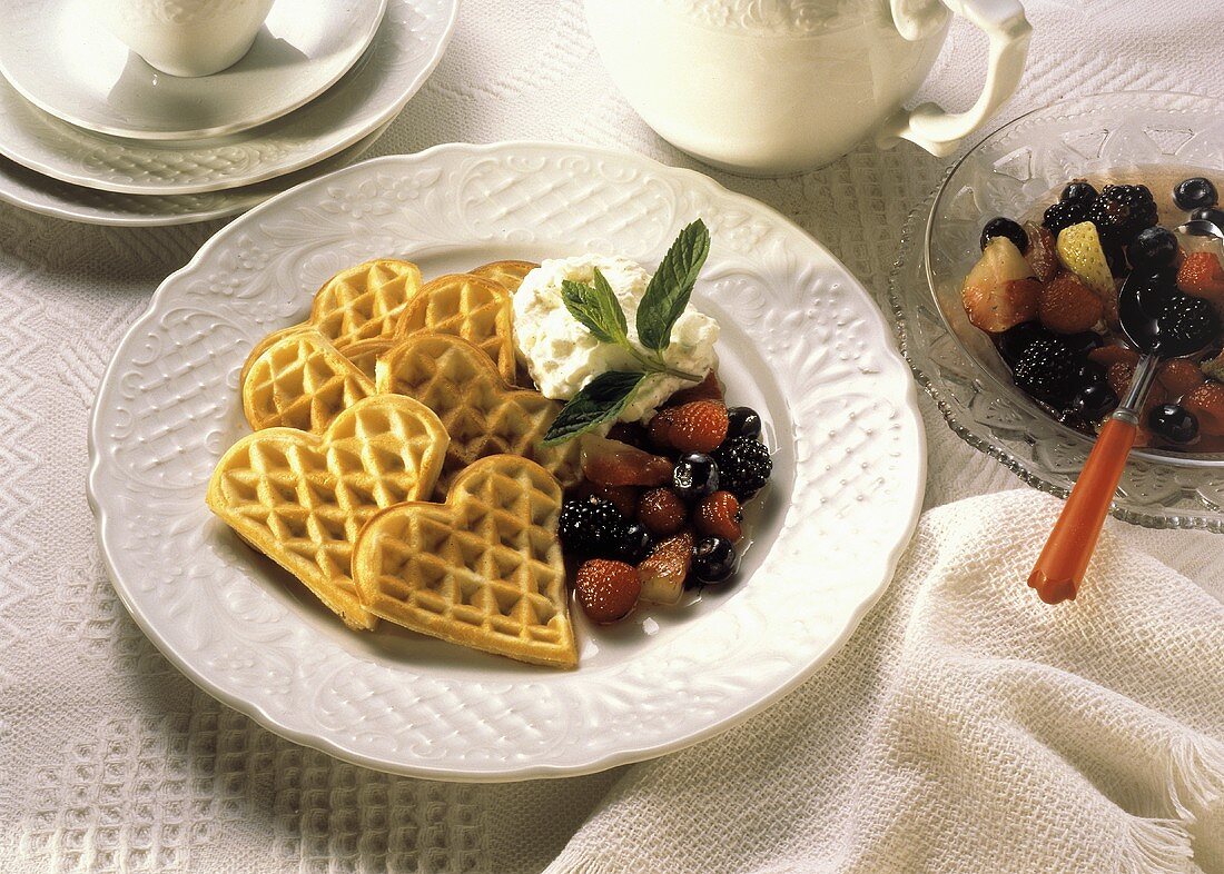 Heart-shaped Waffles with Berries; Whipped Cream