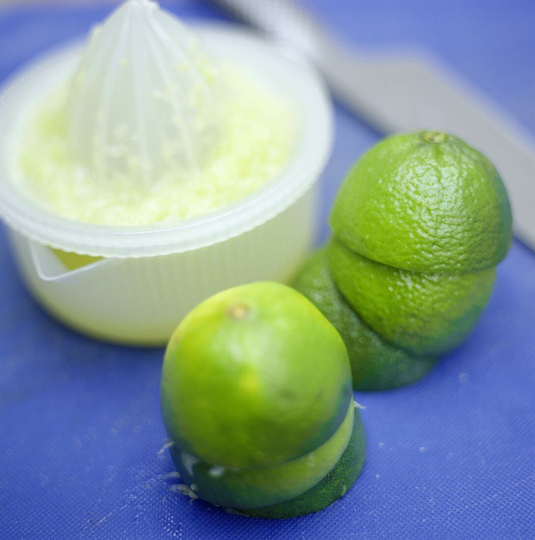Juicer with Lime Juice and Limes