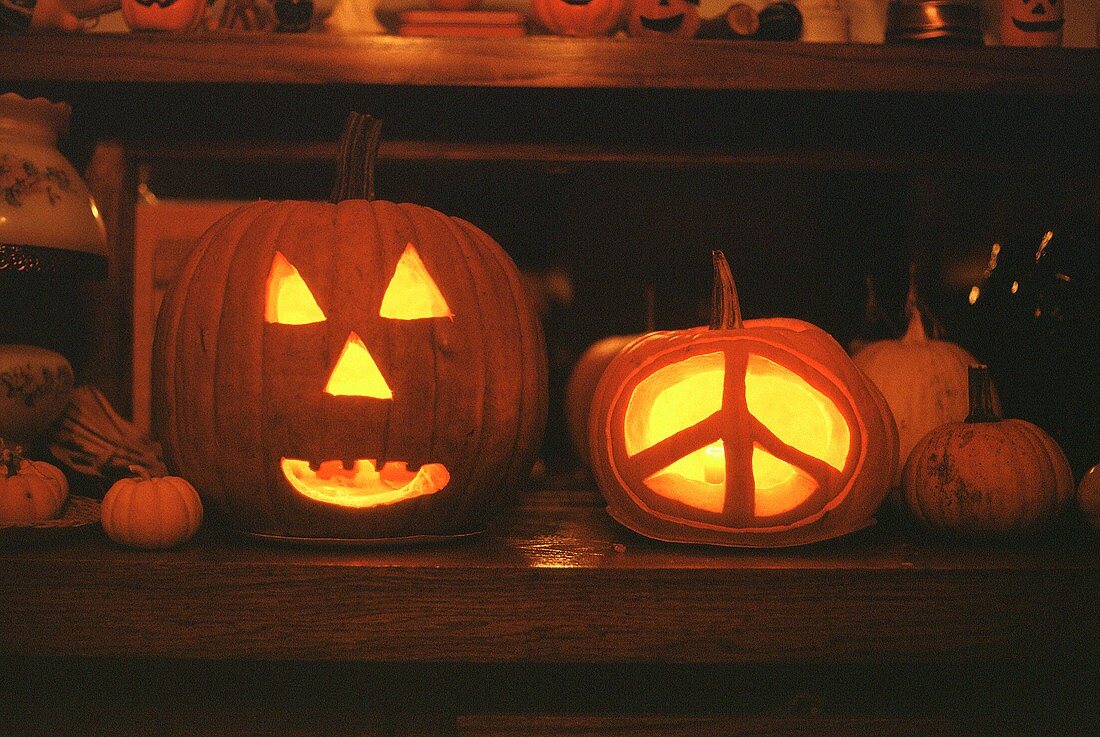 Two Jack O'Lanterns, One with a Peace Sign