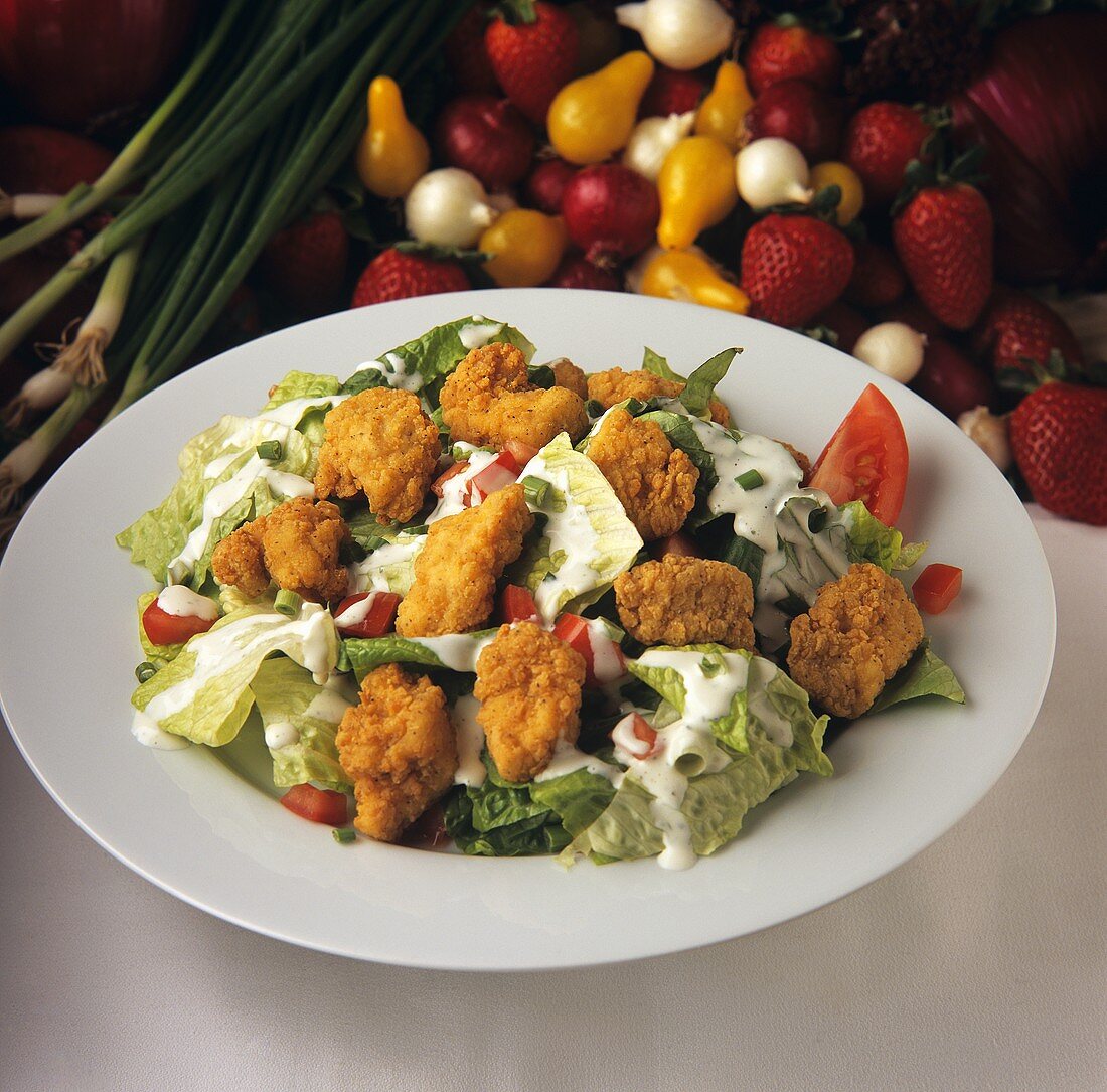 Salad leaves with chicken nuggets