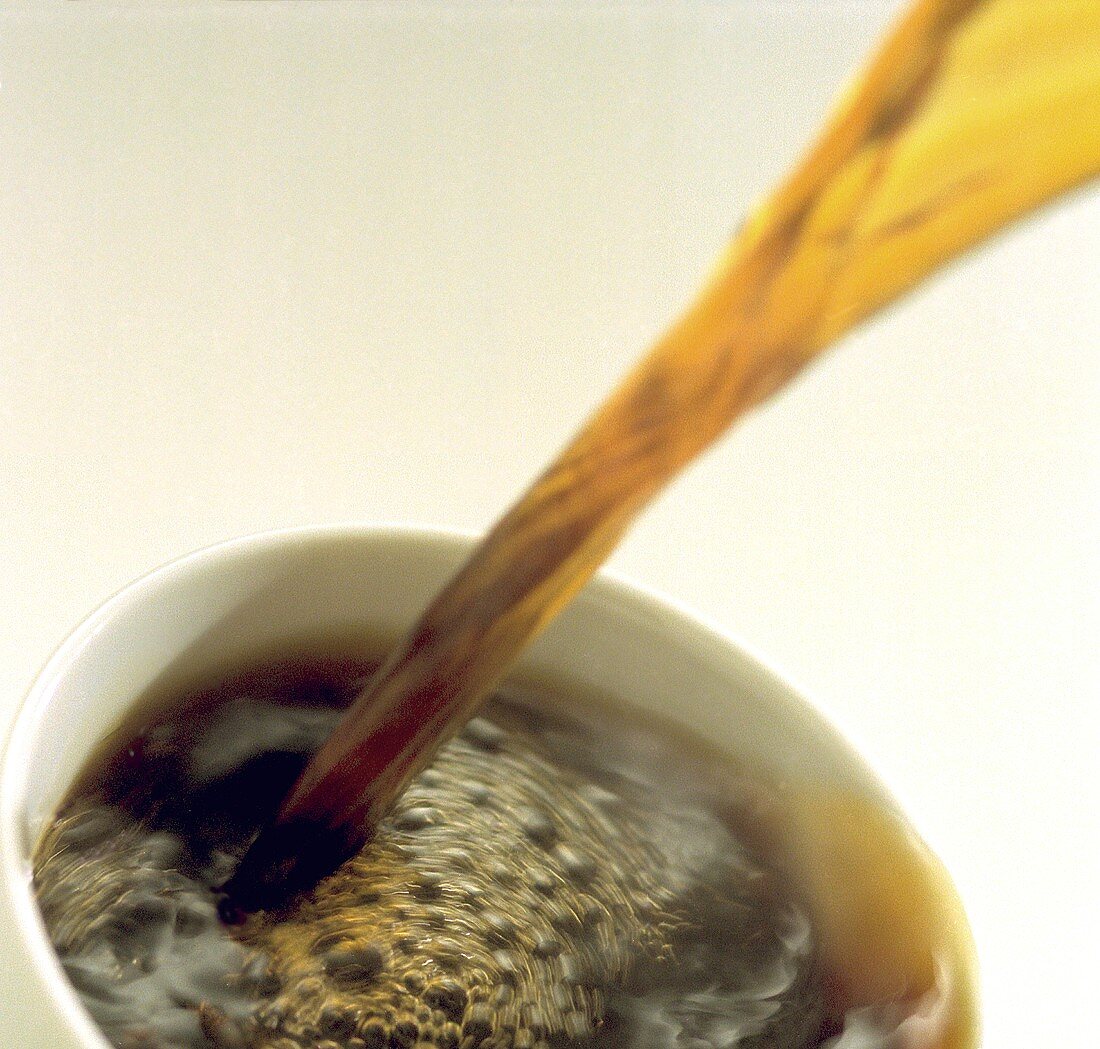 Coffee Pouring into Mug