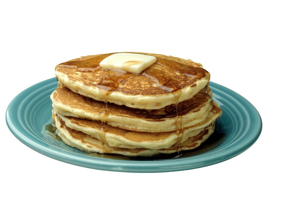 A Stack of Buttered Pancakes with Syrup