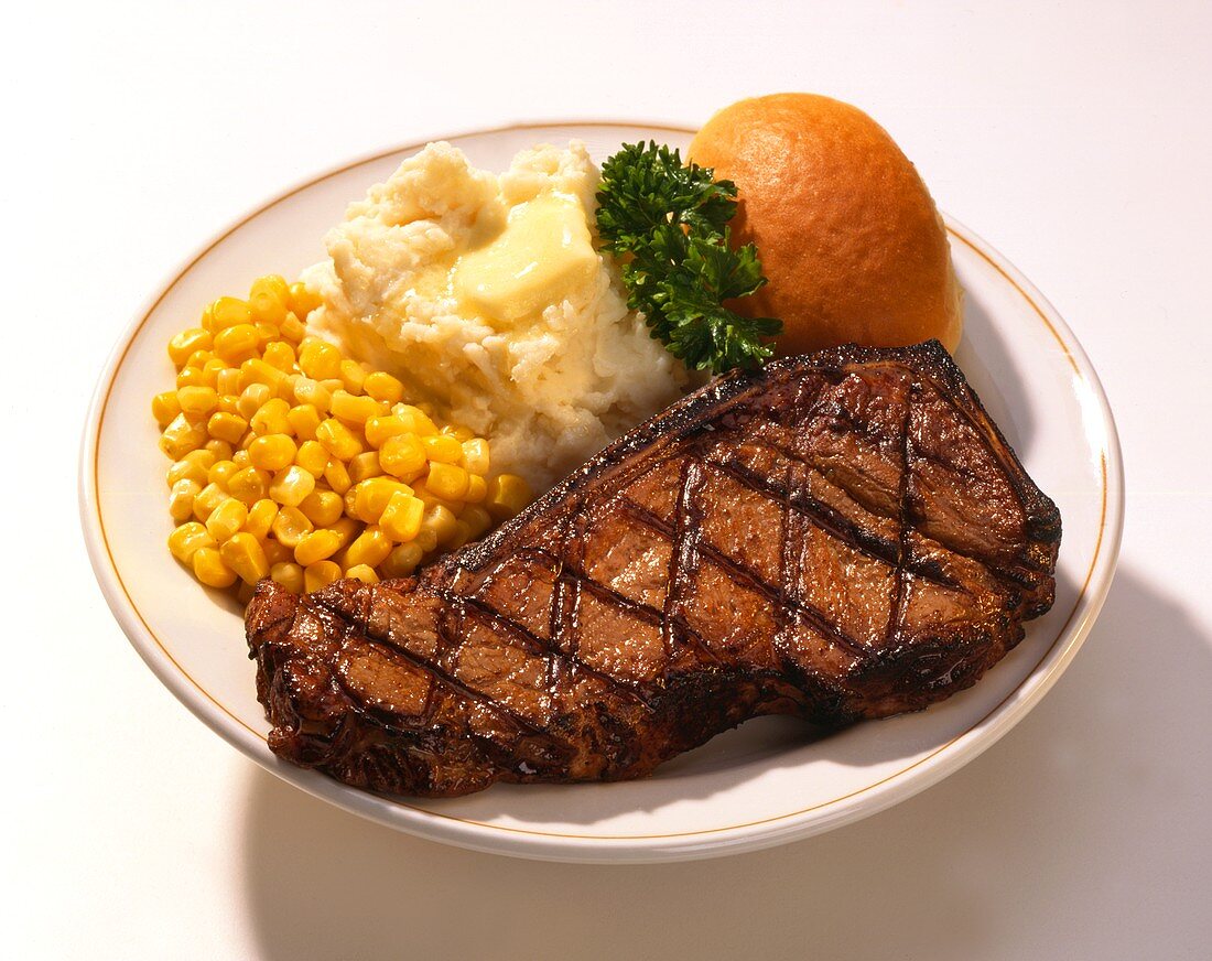Rib-eye Steak with Mashed Potato and Corn