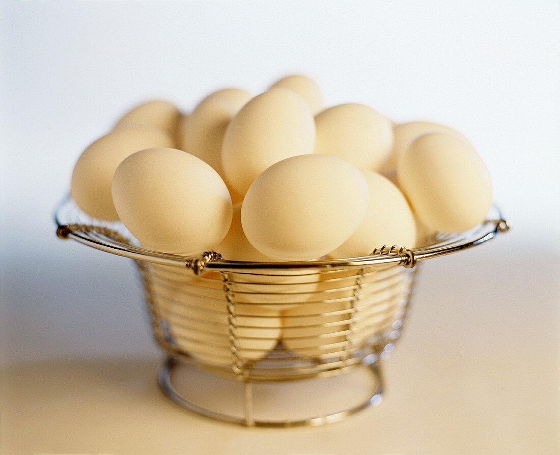 White Eggs in a Wire Basket