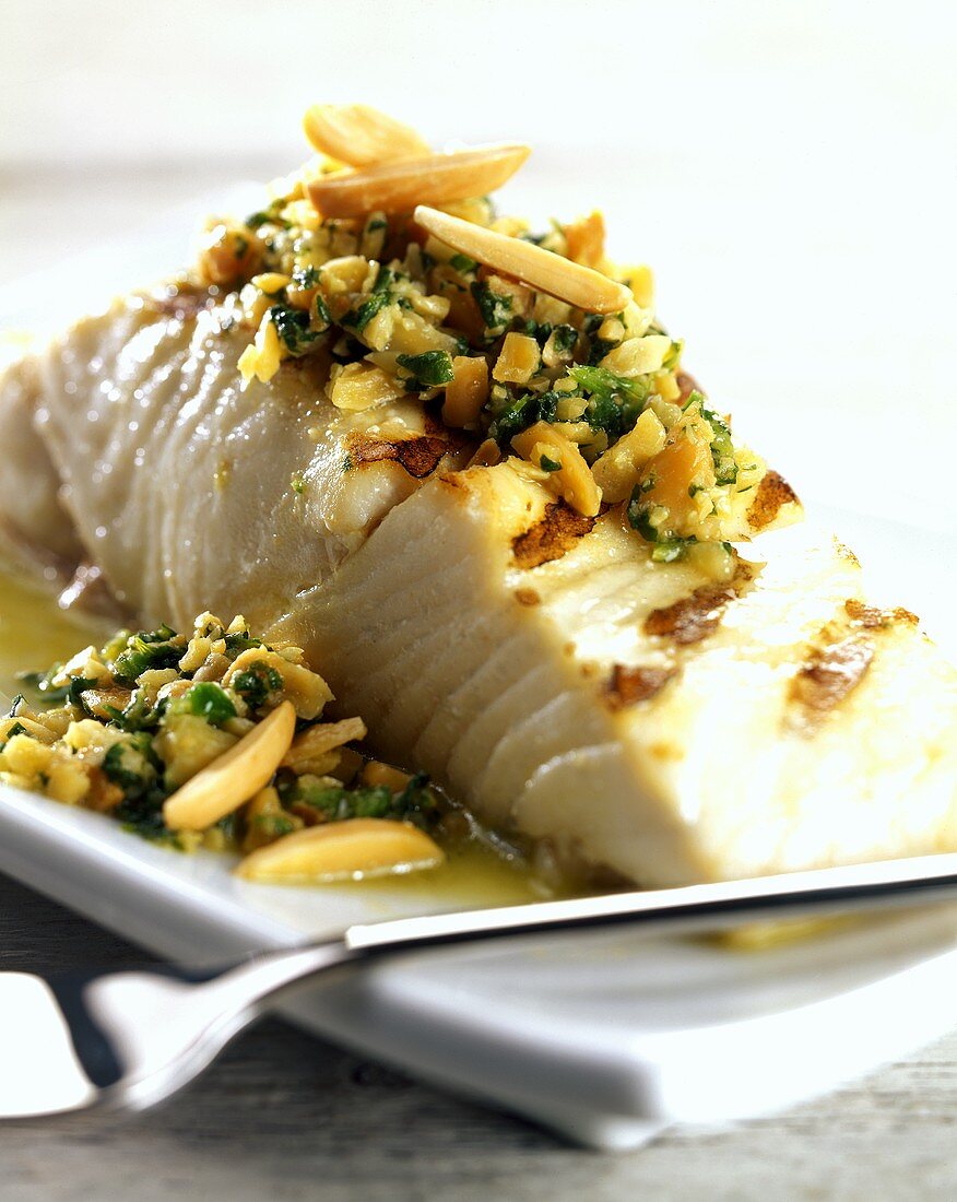 Barbecued fish fillet with almond salsa