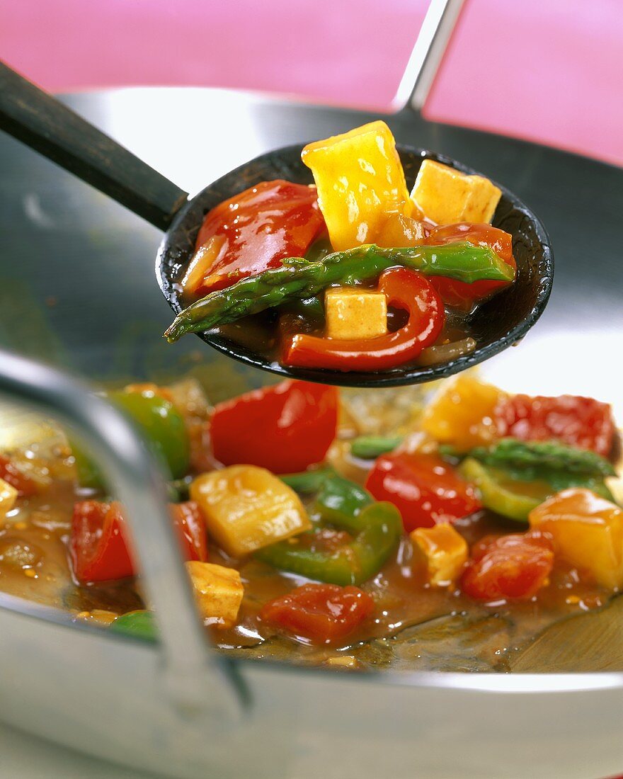 Sweet and sour vegetables, cooked in wok