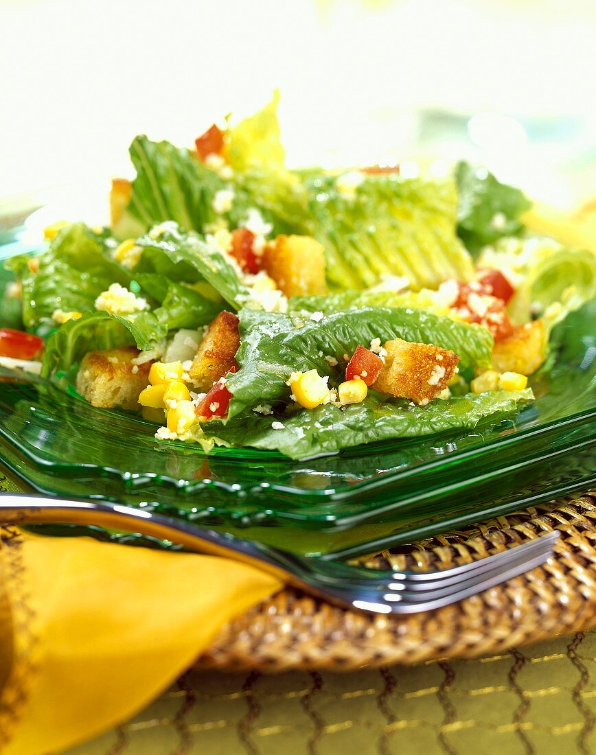 Romaine lettuce with sweetcorn, peppers, feta and croutons