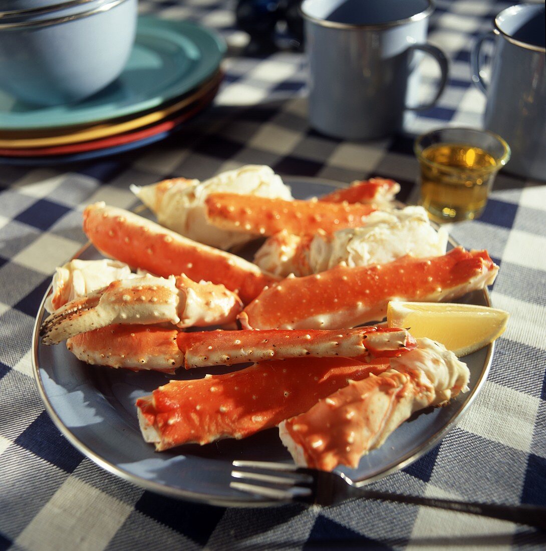 King crab legs on plate with lemon