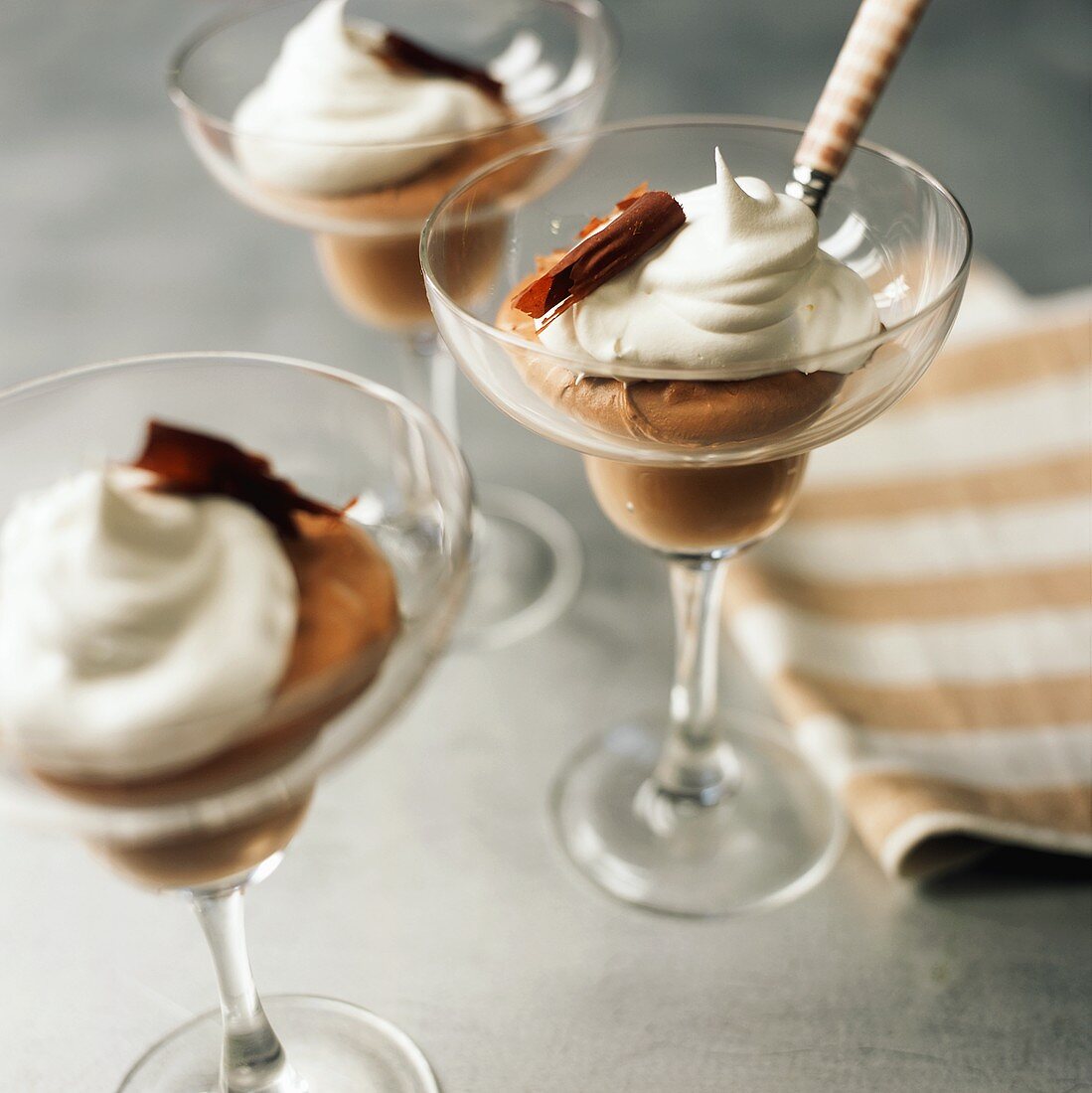 Three Glasses of Chocolate Mousse with Whipped Cream