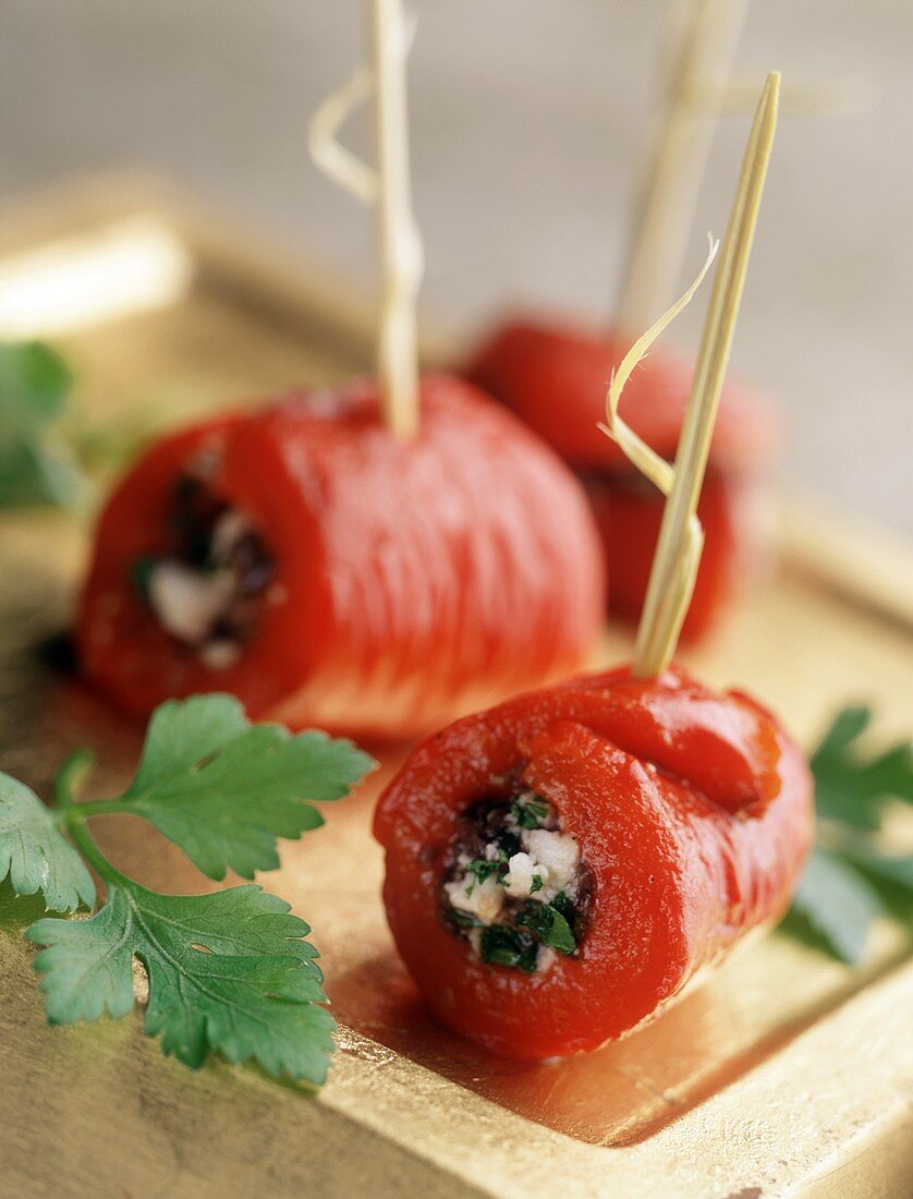 Pepper rolls filled with herb soft cheese