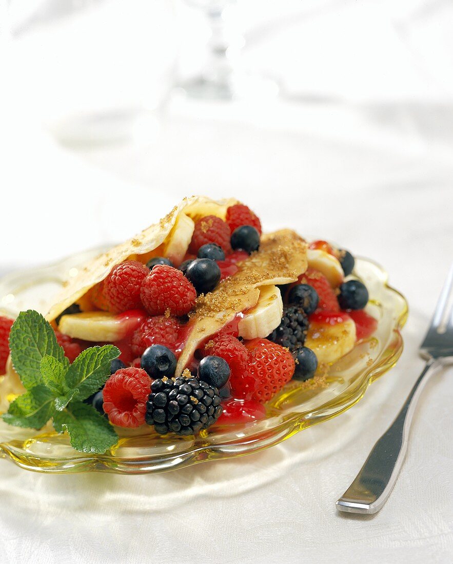 Crepes with berries and banana