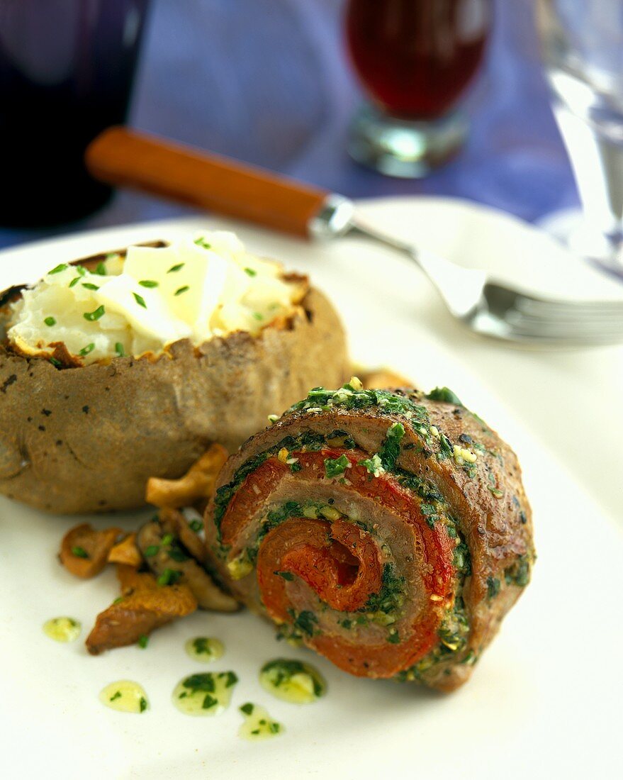 Pinwheel Steak Stuffed with Tomato, Herbs and Garlic and a Baked Potato