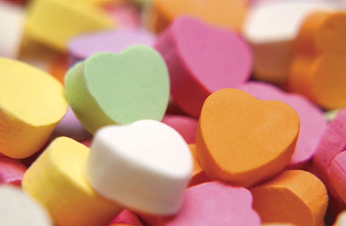 Colourful sugar hearts (filling the picture)