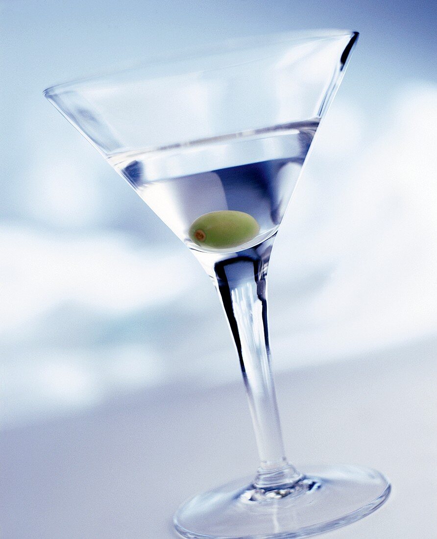 A Martini with a Stirrer and an Olive