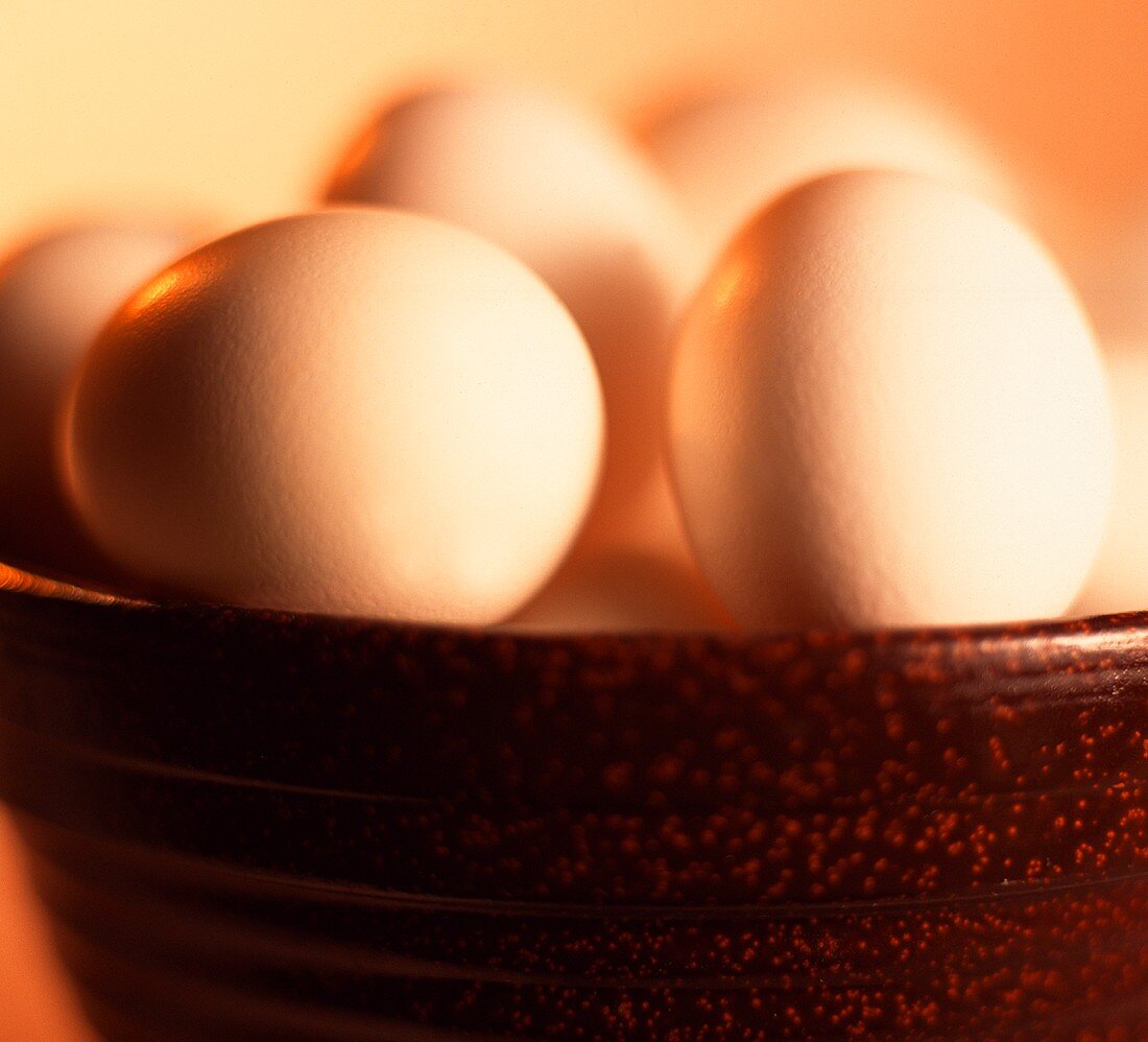 Brown eggs in a bowl (close-up)