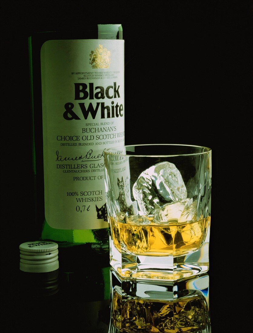 A Bottle and a Glass of Scotch; Black & White Scotch