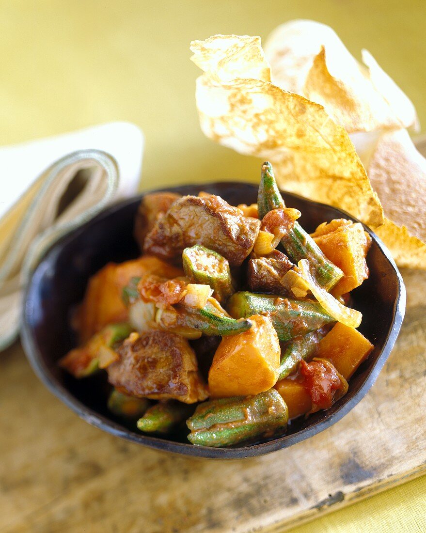 Lamb stew with okra pods and pumpkin