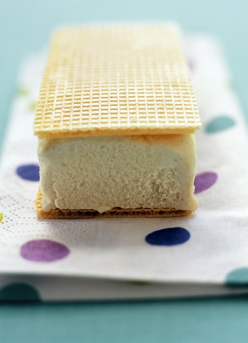 Vanilla ice cream wafer on a paper napkin