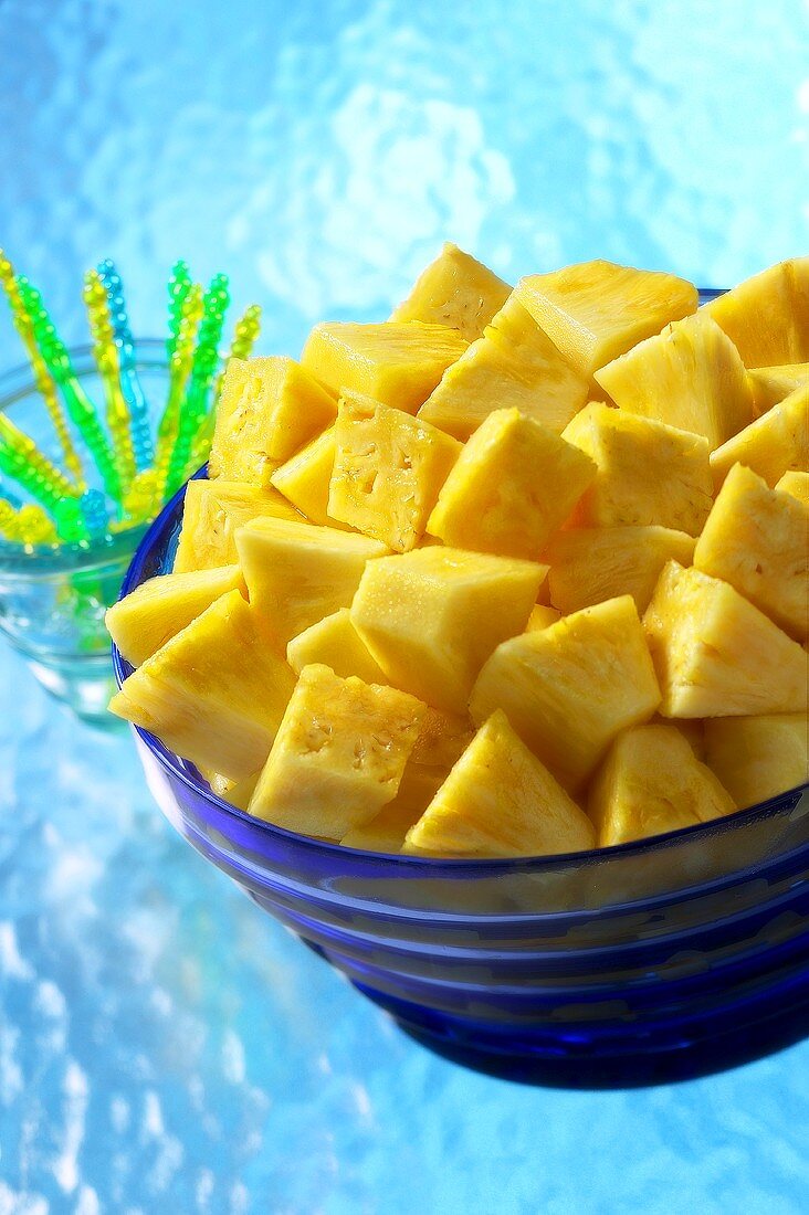 Pineapple pieces in a glass bowl