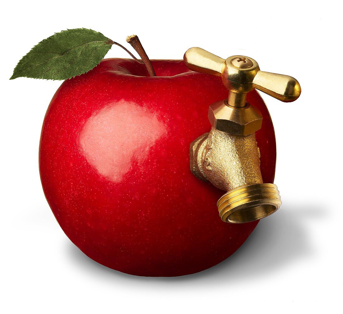 Apfel mit einem Zapfhahn (Symolbild Apfelsaft)