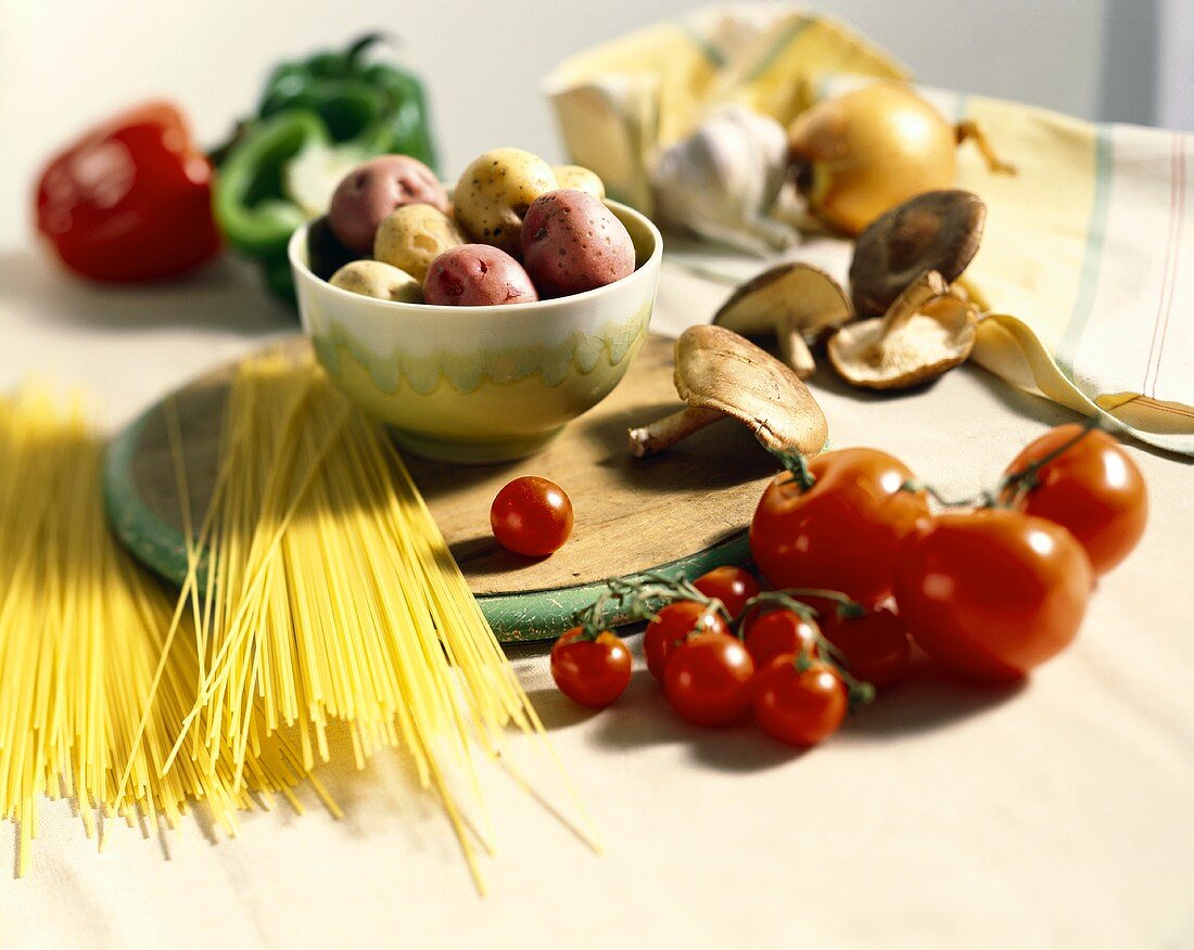 Still life with pasta, vegetables and mushrooms