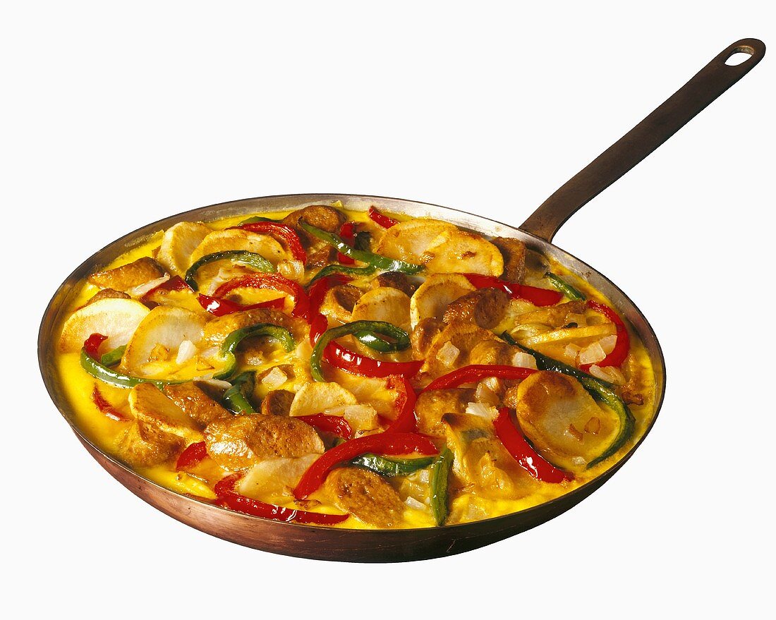 A Frittata with Peppers, Potatoes and Sausage