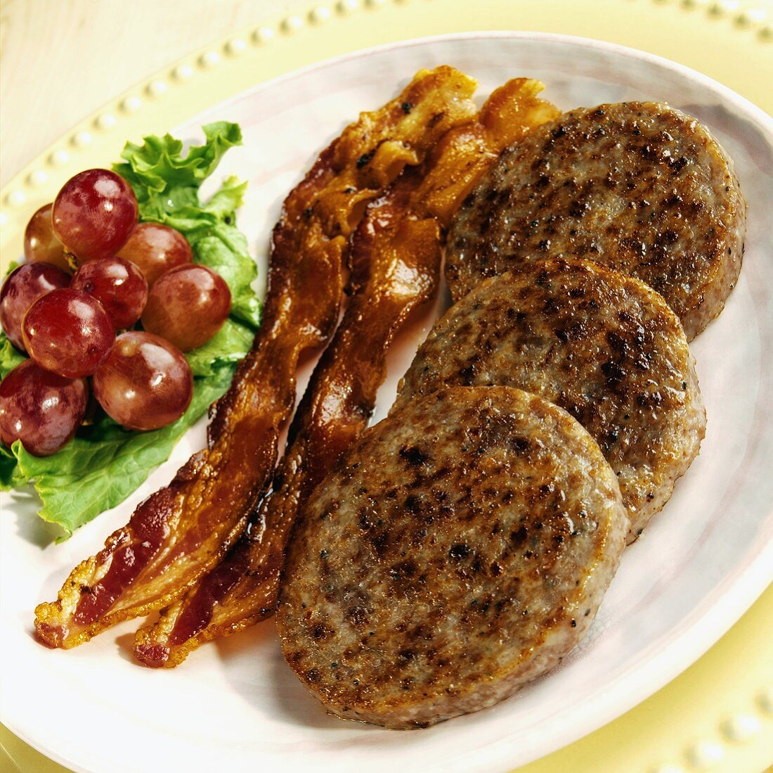 Sausage Patties and Bacon Strips and Grapes