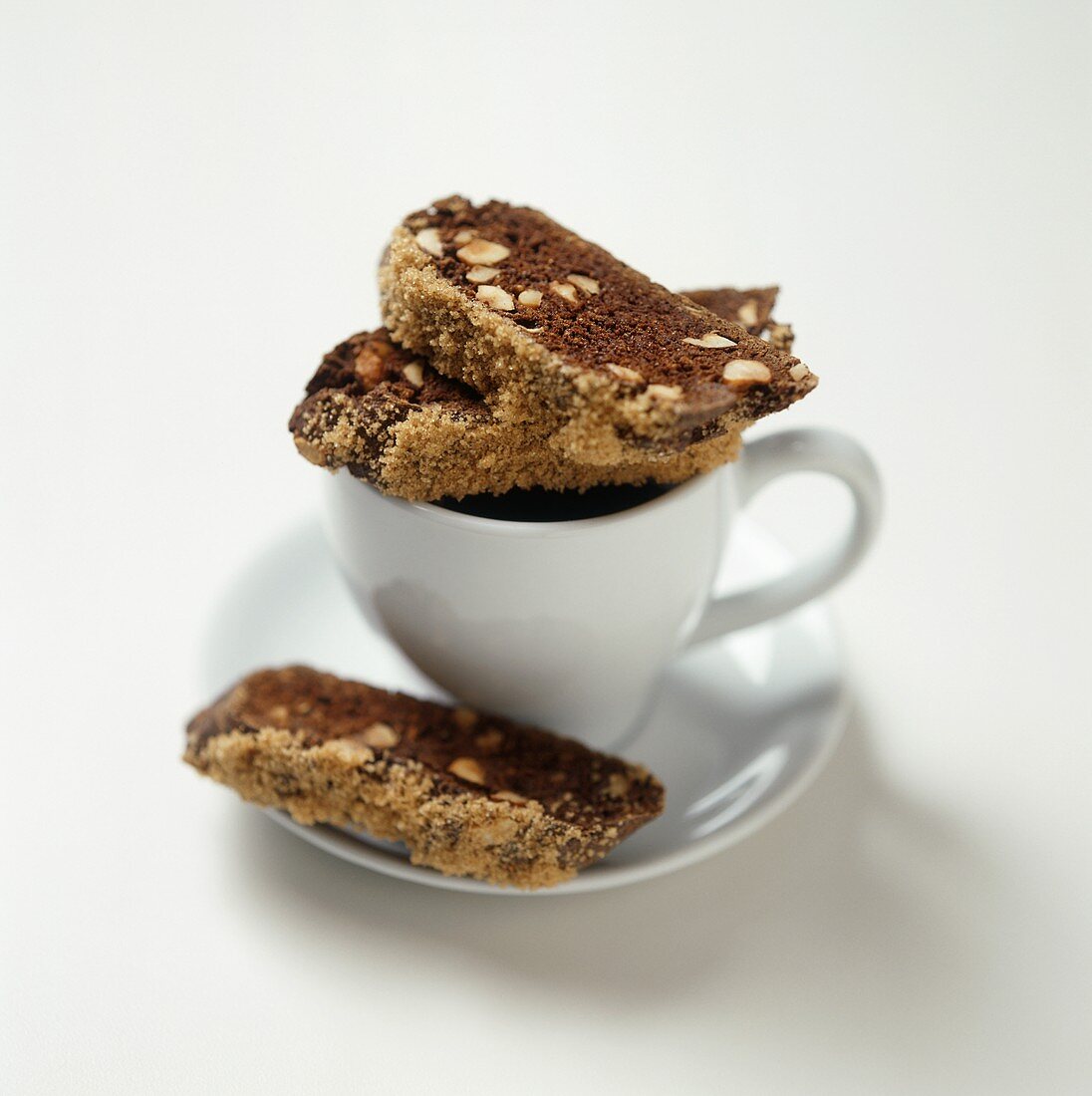 Chocolate Hazelnut Biscotti on Coffee Cup and Saucer