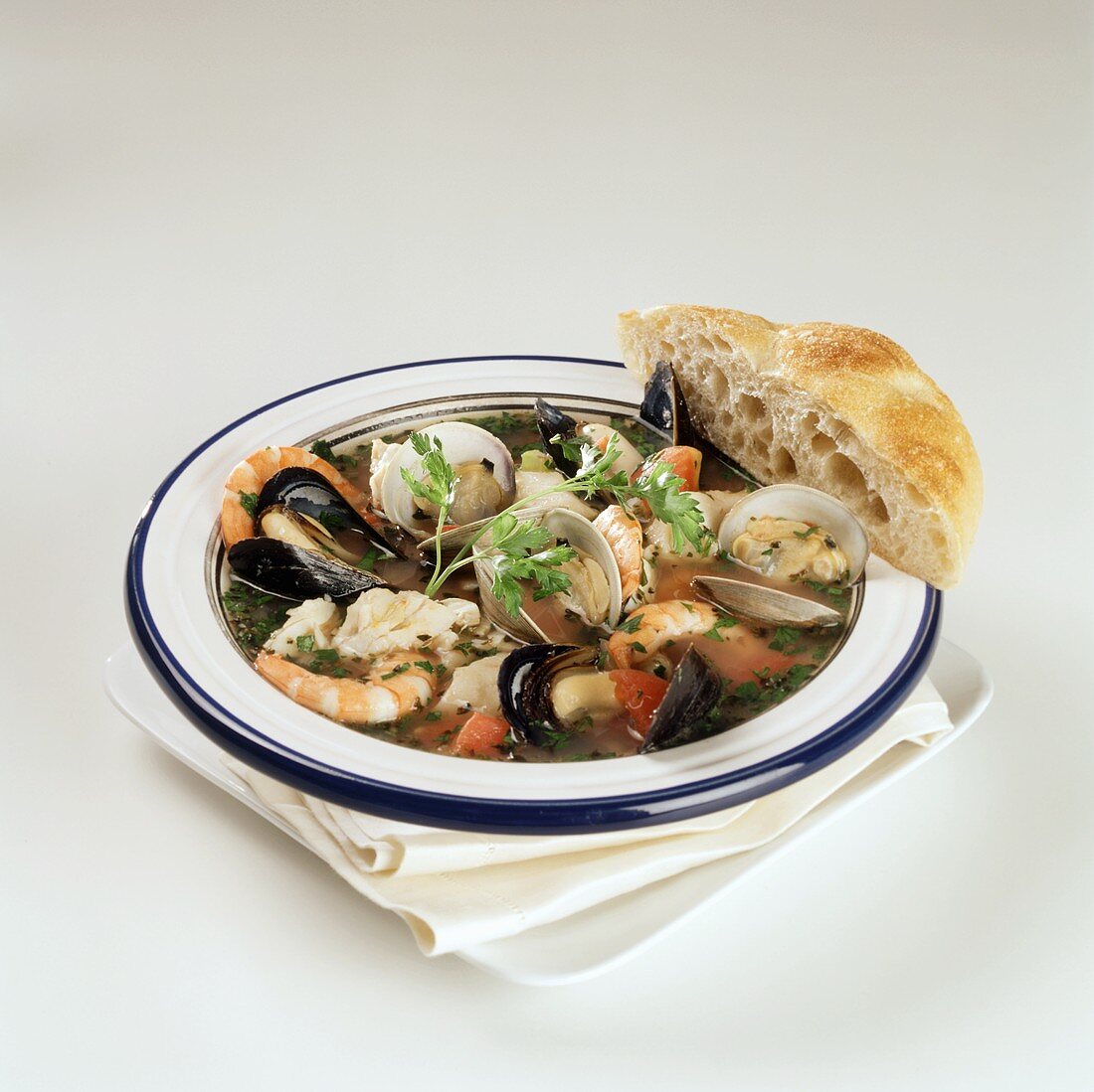 Cioppino (seafood stew) with bread