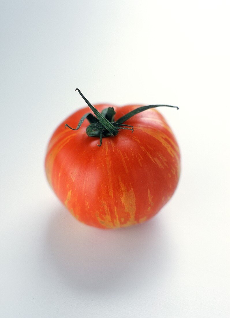 A Tomato with Yellow Streaks