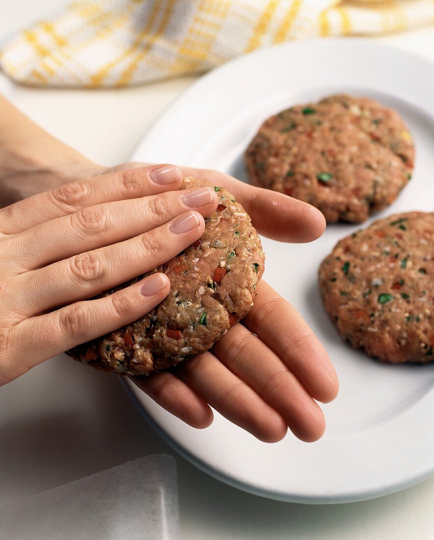 Hands Forming Turkey Burgers