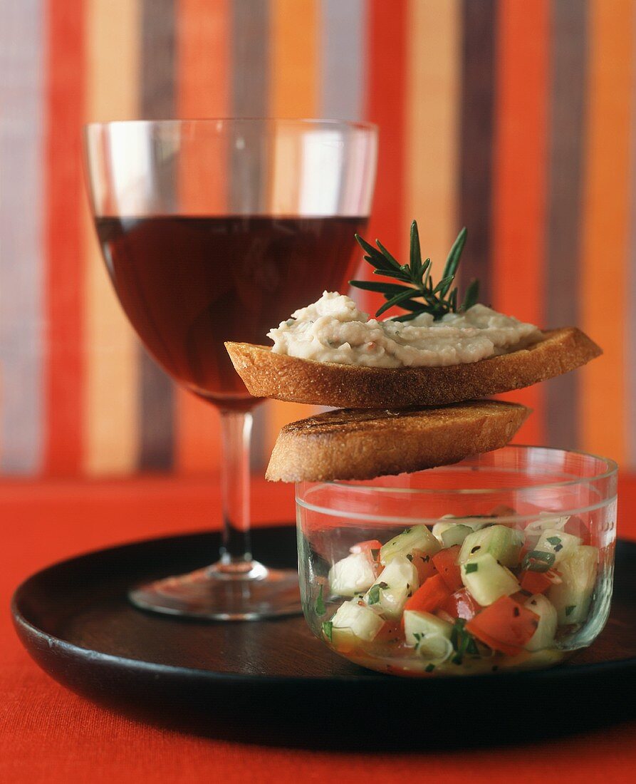 Tapas (White Bean Spread and Cucumber and Tomato Salad) with Red Wine