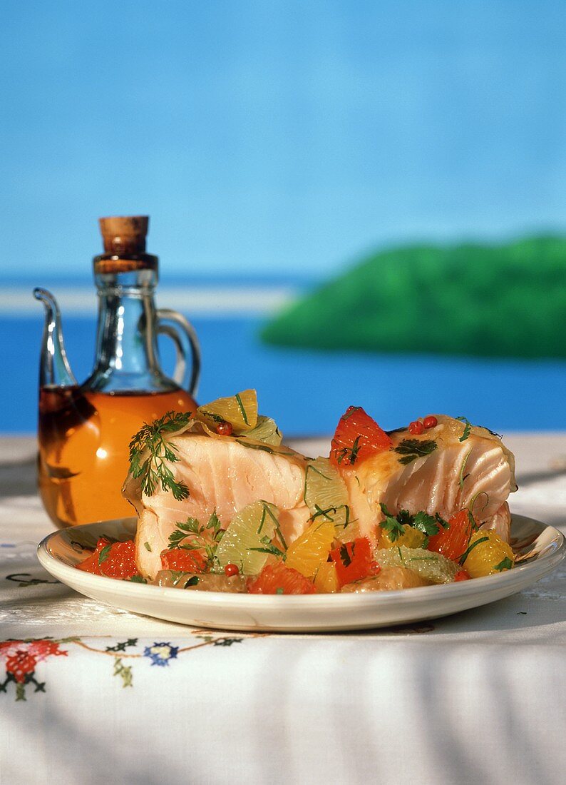 Tuna with Citrus Salsa and Olive Oil on a Table by the Water