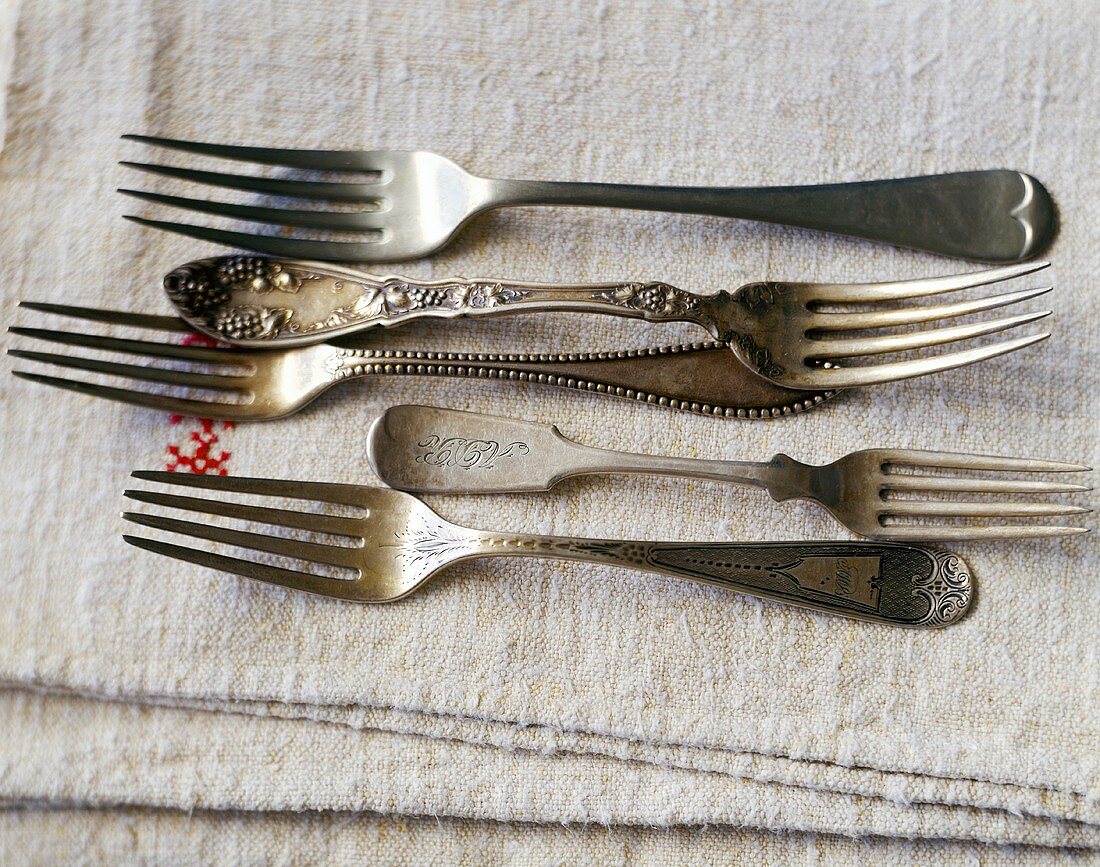 Five different old forks