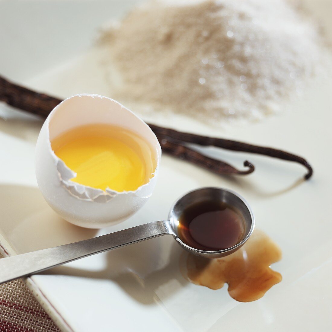 An Egg Yolk in the Shell with Vanilla and Sugar