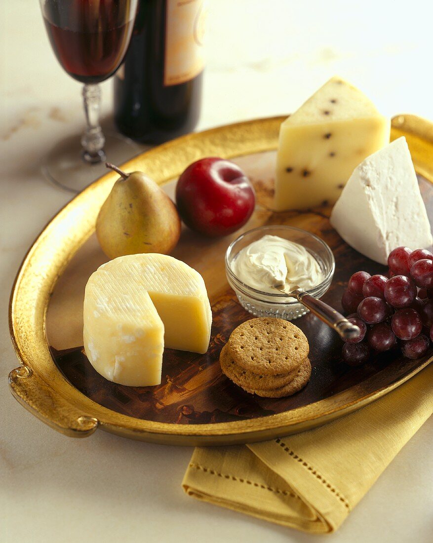Assorted Cheeses with Fruit and Crackers on a Tray