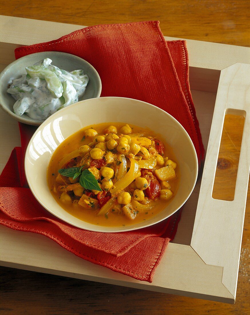 Chick-pea and tomato curry with cucumber raita