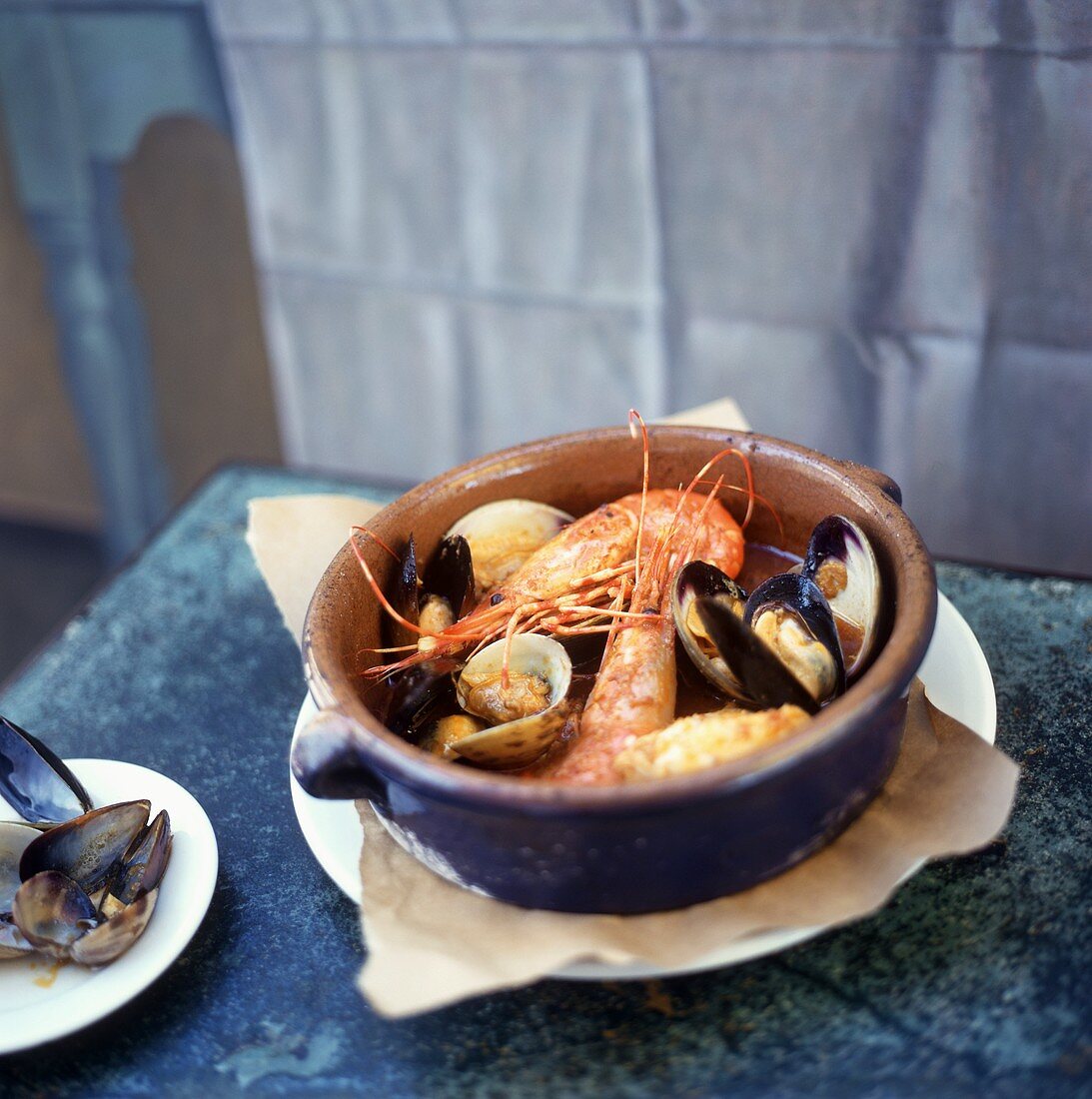 Seafood stew in ceramic bowl